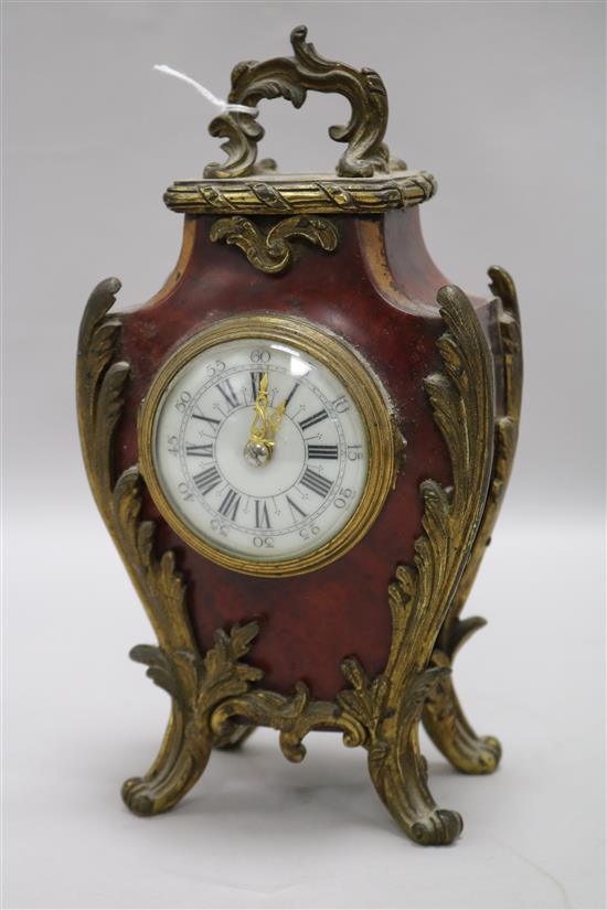 A tortoiseshell timepiece H.21.5cm W.12cm